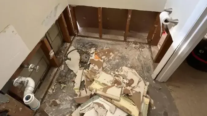 Bathroom stripped back to the studs after a sewage backup